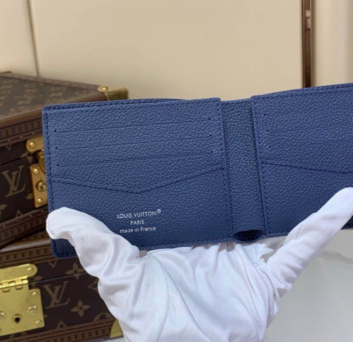 Cartera Louis Vuitton Multiple Wallet en el estampado Damier Pop