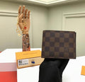 Cartera Multiple Wallet en lona Damier Graphite de Louis Vuitton