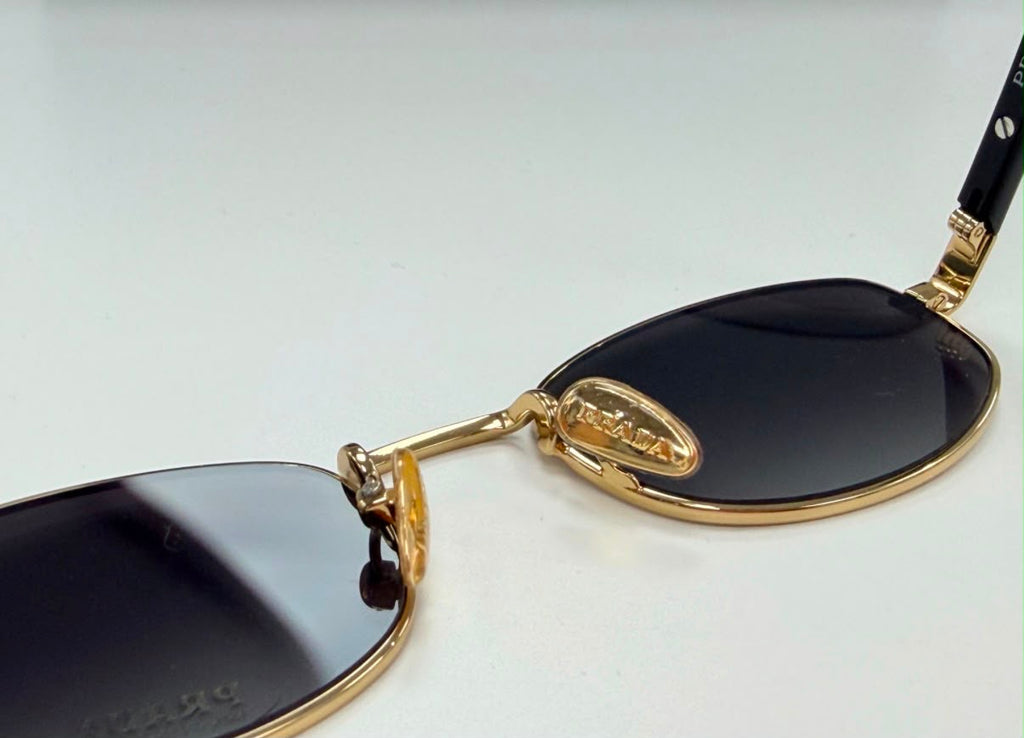 Gafas Prada Metal Plaque Oval